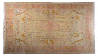 An Oushak Wool Carpet, CIRCA 1900, Length 12 feet 8 inches x width 10 feet 3 inches. — CIRCA 1900