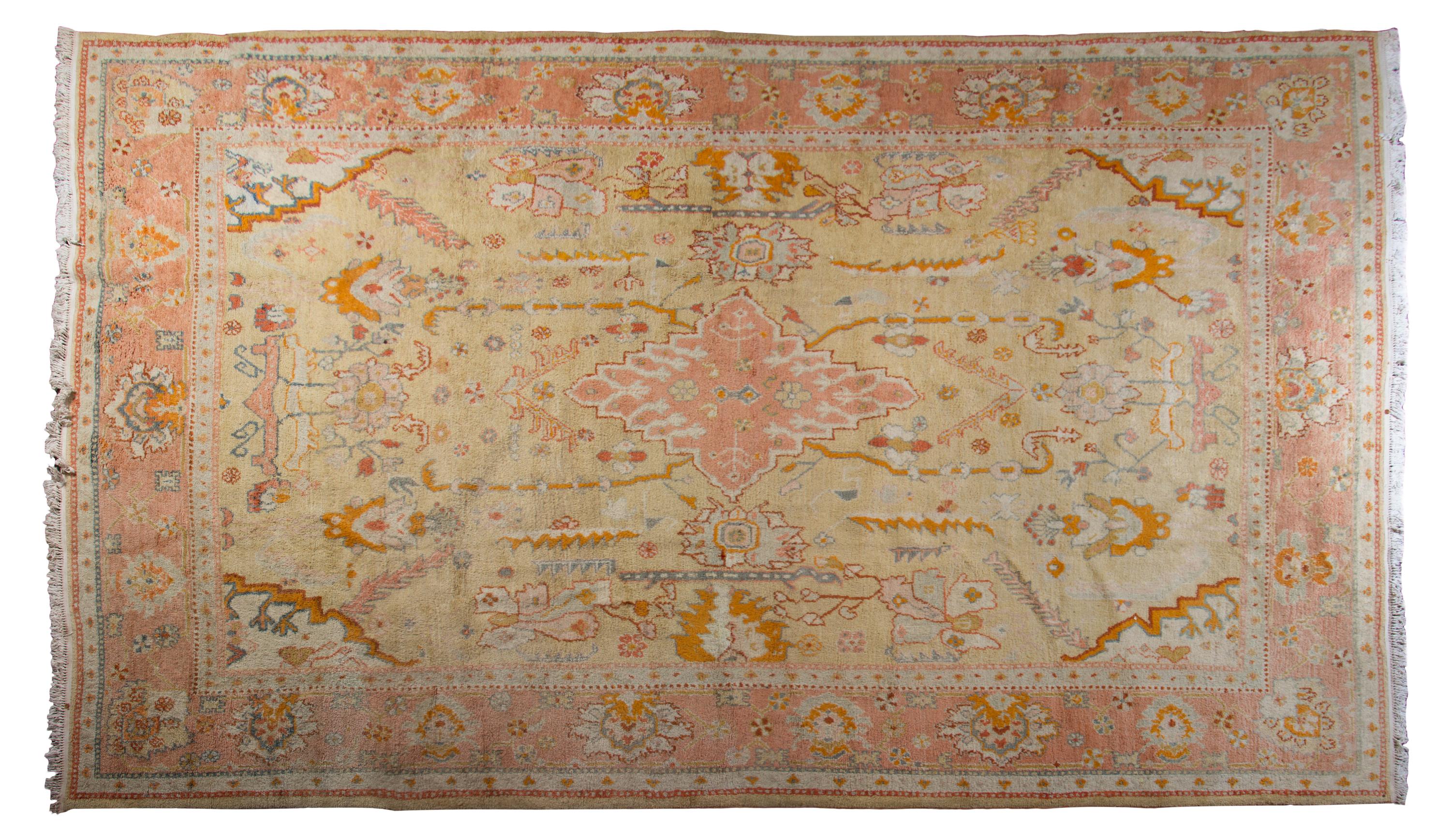 An Oushak Wool Carpet, CIRCA 1900, Length 12 feet 8 inches x width 10 feet 3 inches. — CIRCA 1900