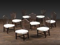 A Set of Eight Federal Carved Mahogany Shield-Back Dining Chairs
