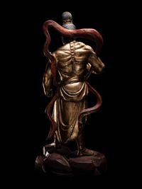 A Pair of Chinese Gilt and Red Lacquered Wood Figures of Wrathful Guardians