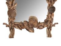 An Italian Grotto Style Mirror