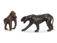 Two Leather Clad Animal Figures