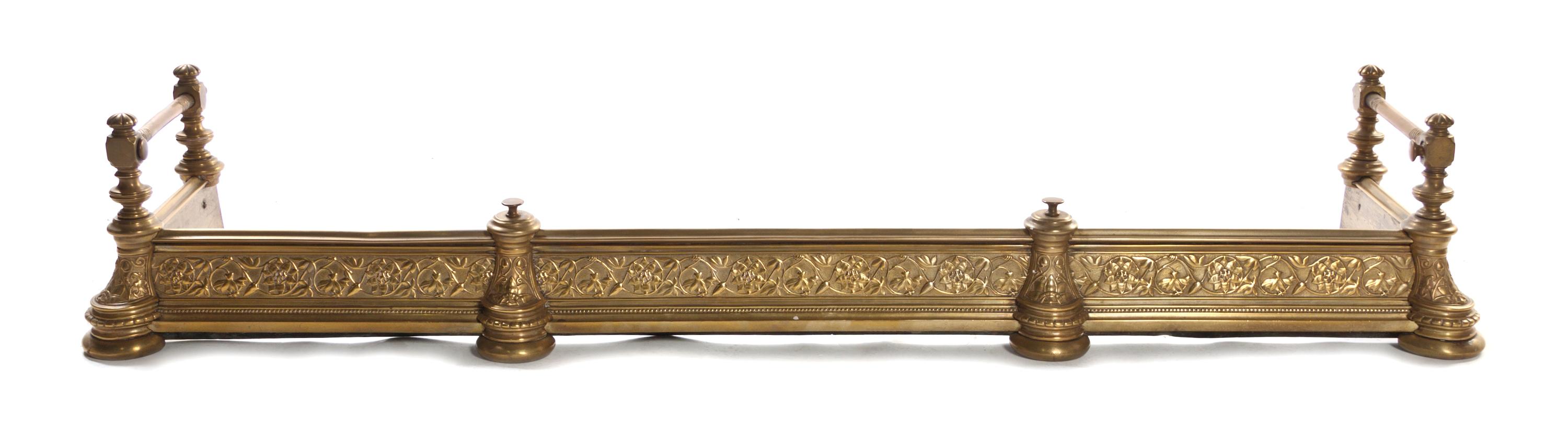 A Victorian Pressed Brass and Wrought Iron Fire Fender, Width 60 inches.
