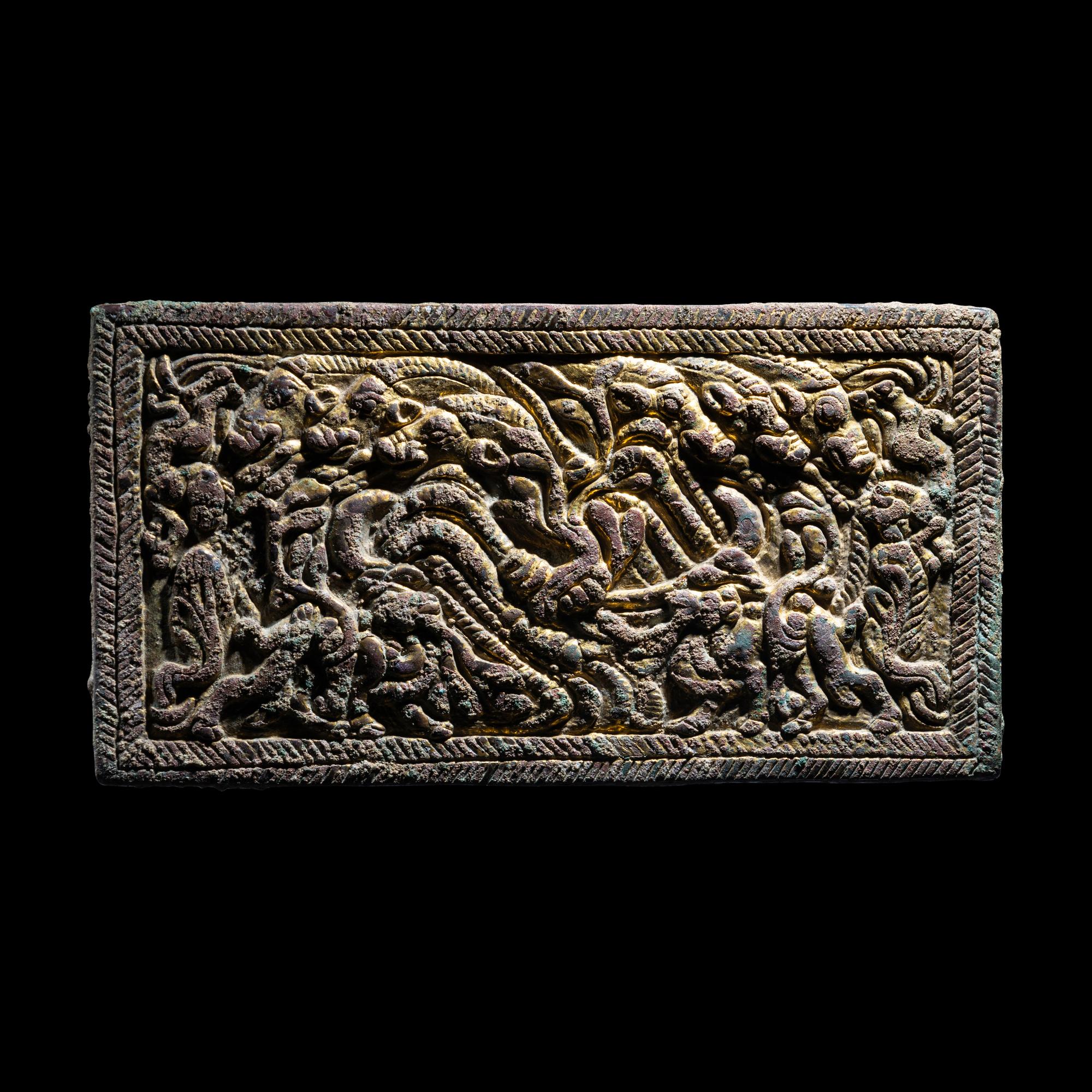A Pair of Eurasian Gilt-Bronze Plaques