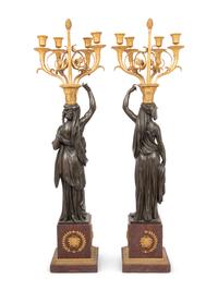 A Pair of Empire Style Gilt and Patinated Bronze and Marble Figural Four-Light Candelabra