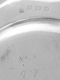 A Set of Ten George III Silver Dinner Plates