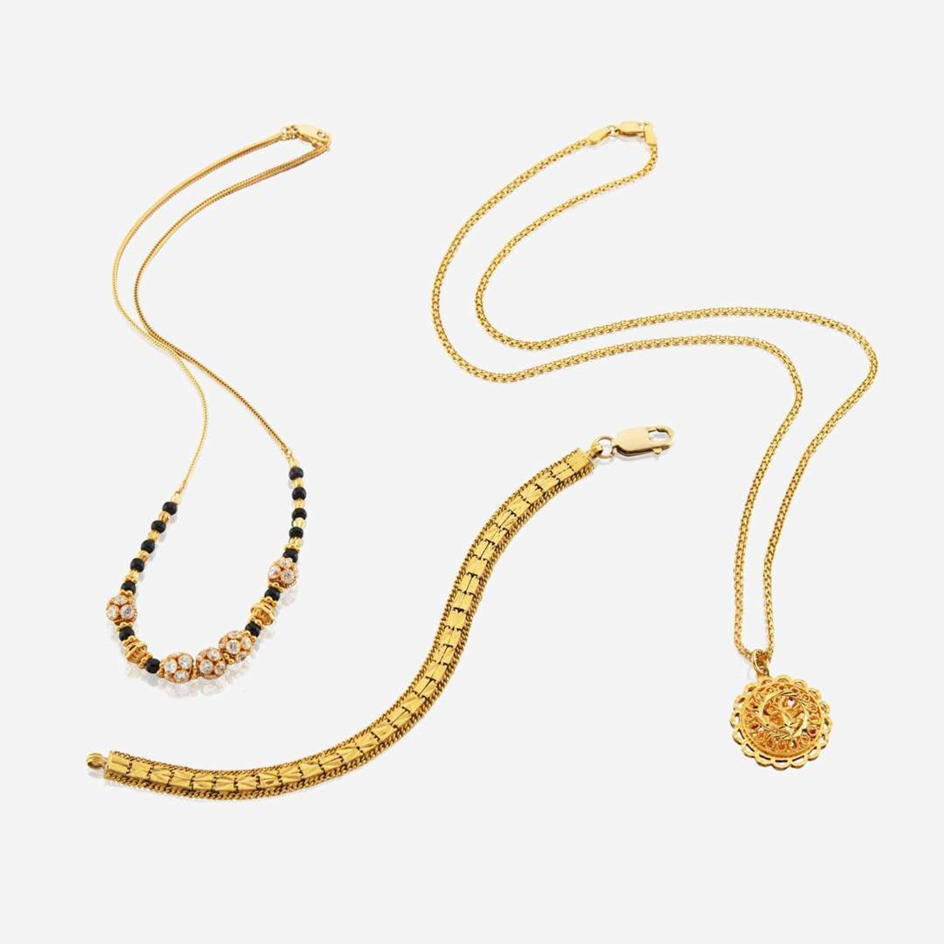 A collection of high karat gold jewelry