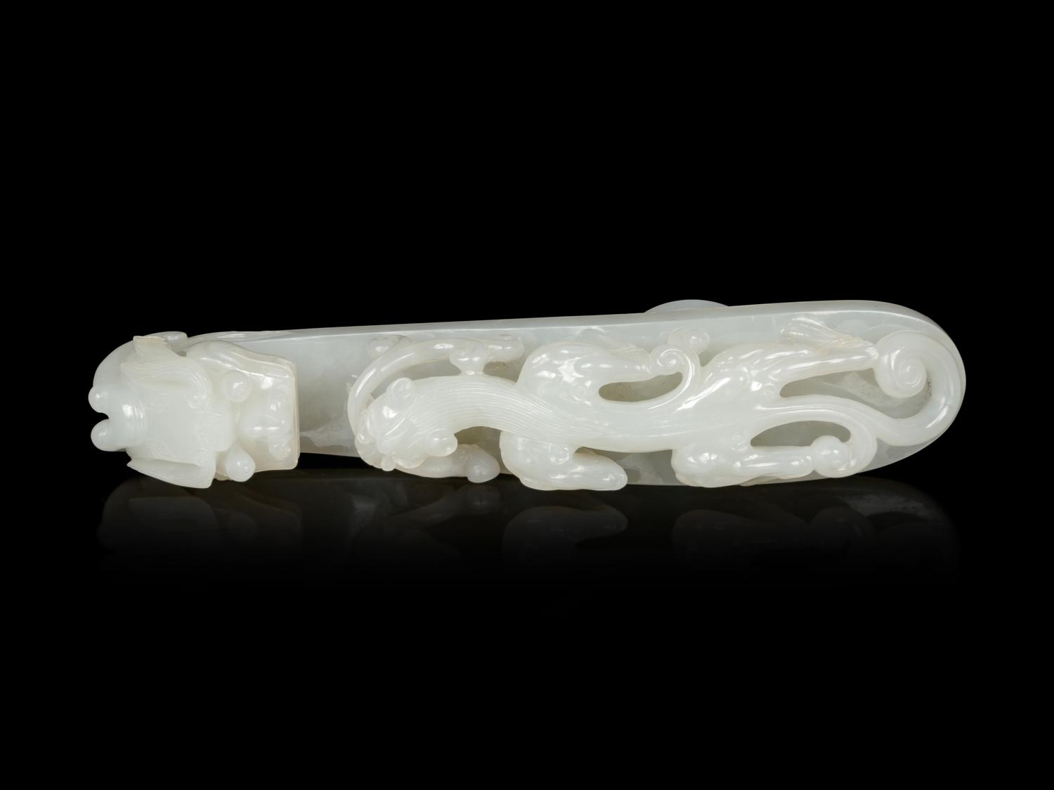 A Large and Finely Carved White Jade 'Chilong' Belt Hook