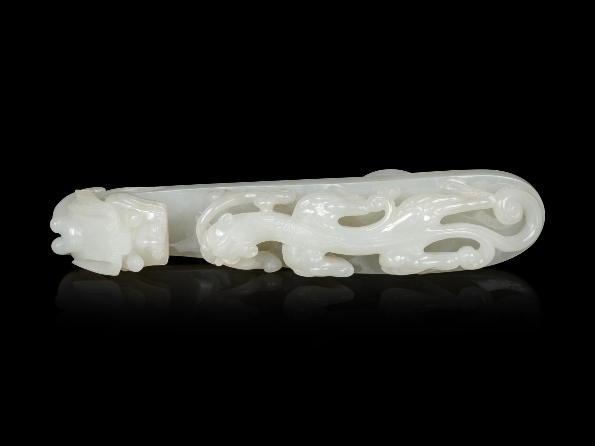 A Large and Finely Carved White Jade 'Chilong' Belt Hook