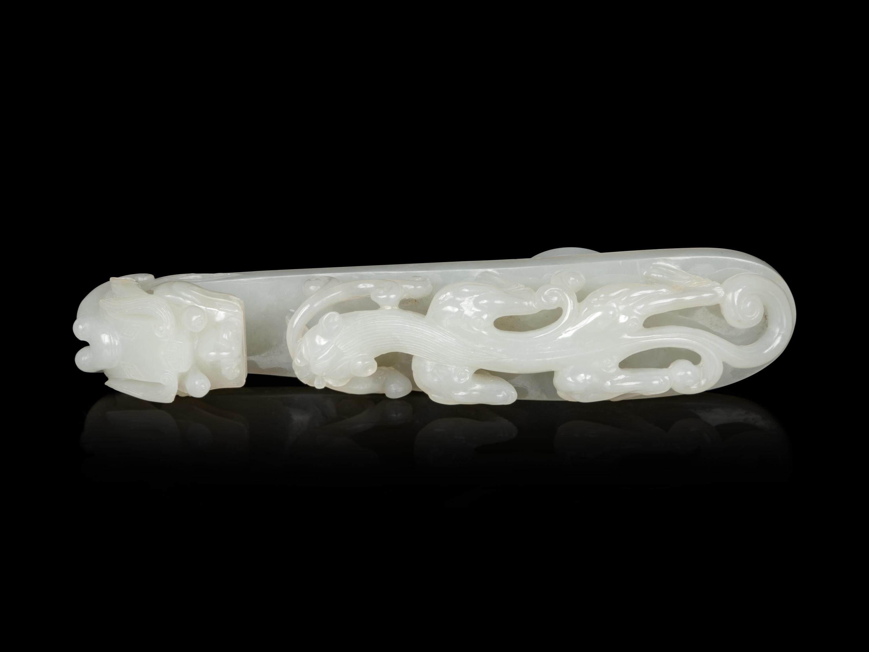 A Large and Finely Carved White Jade 'Chilong' Belt Hook