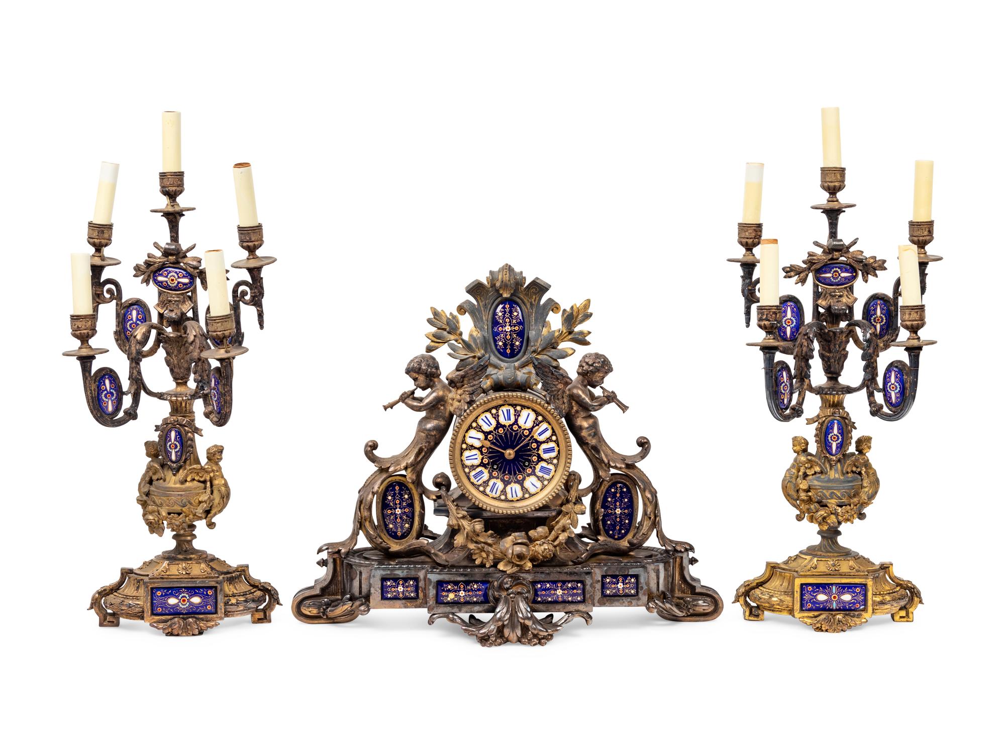 A Napoleon III Gilt Bronze and Enamel Clock Garniture