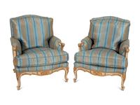 A Pair of Louis XV Style Painted and Parcel Gilt Bergeres