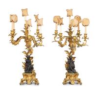 A Pair of Louis XV Style Gilt and Patinated Bronze Figural Six-Light Candelabra