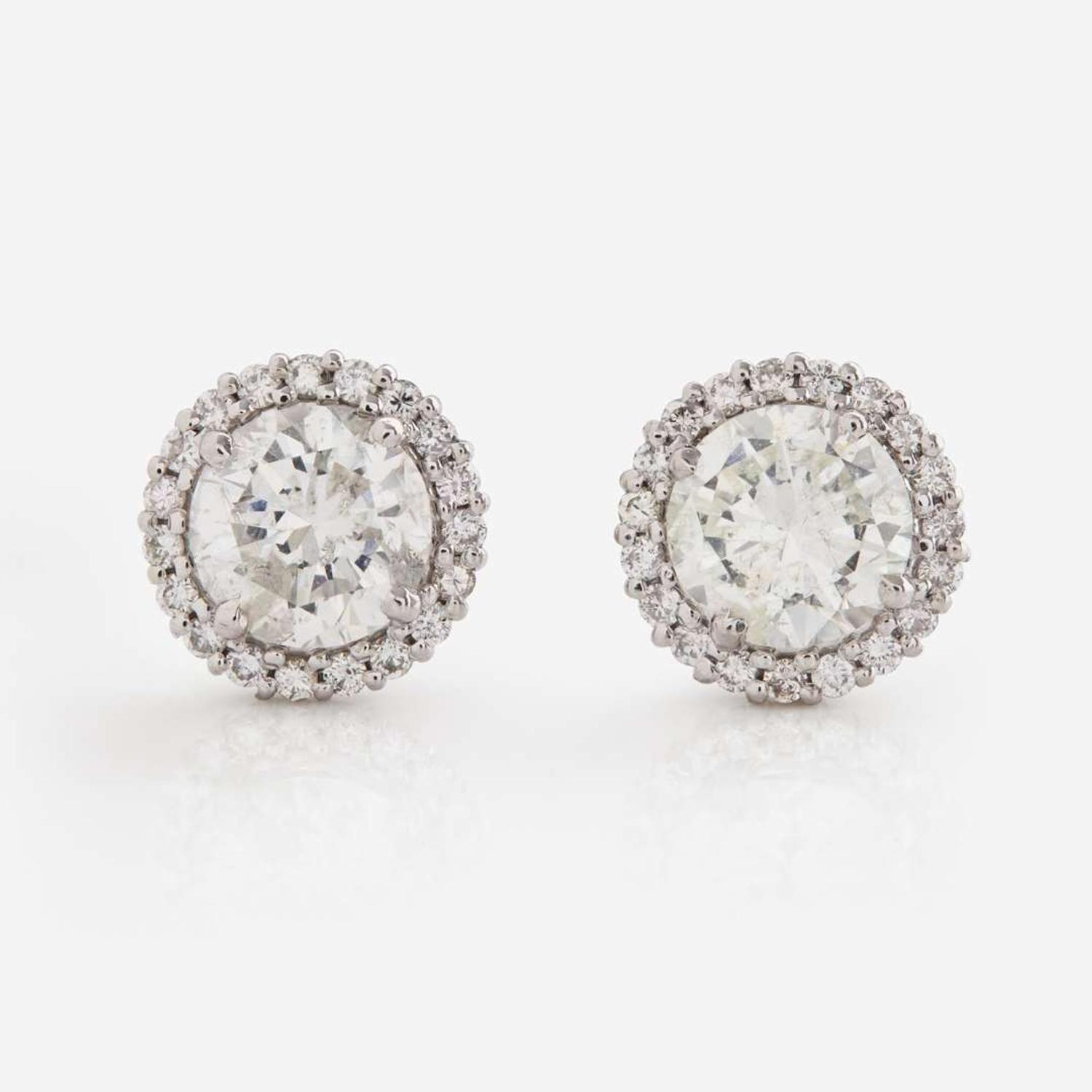 A Pair of 18K White Gold and Diamond Earrings