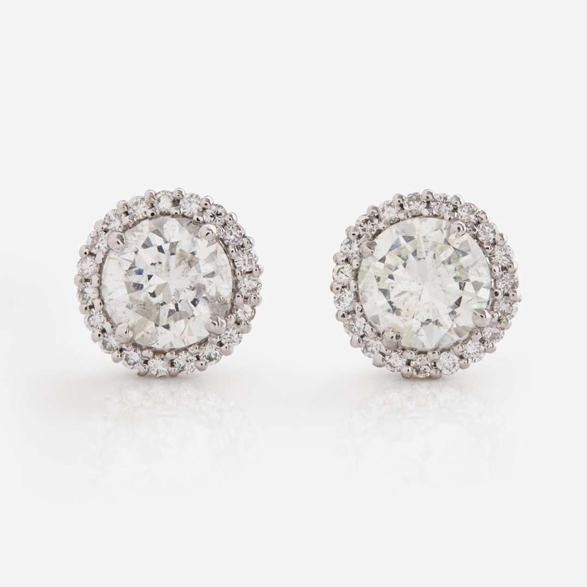 A Pair of 18K White Gold and Diamond Earrings