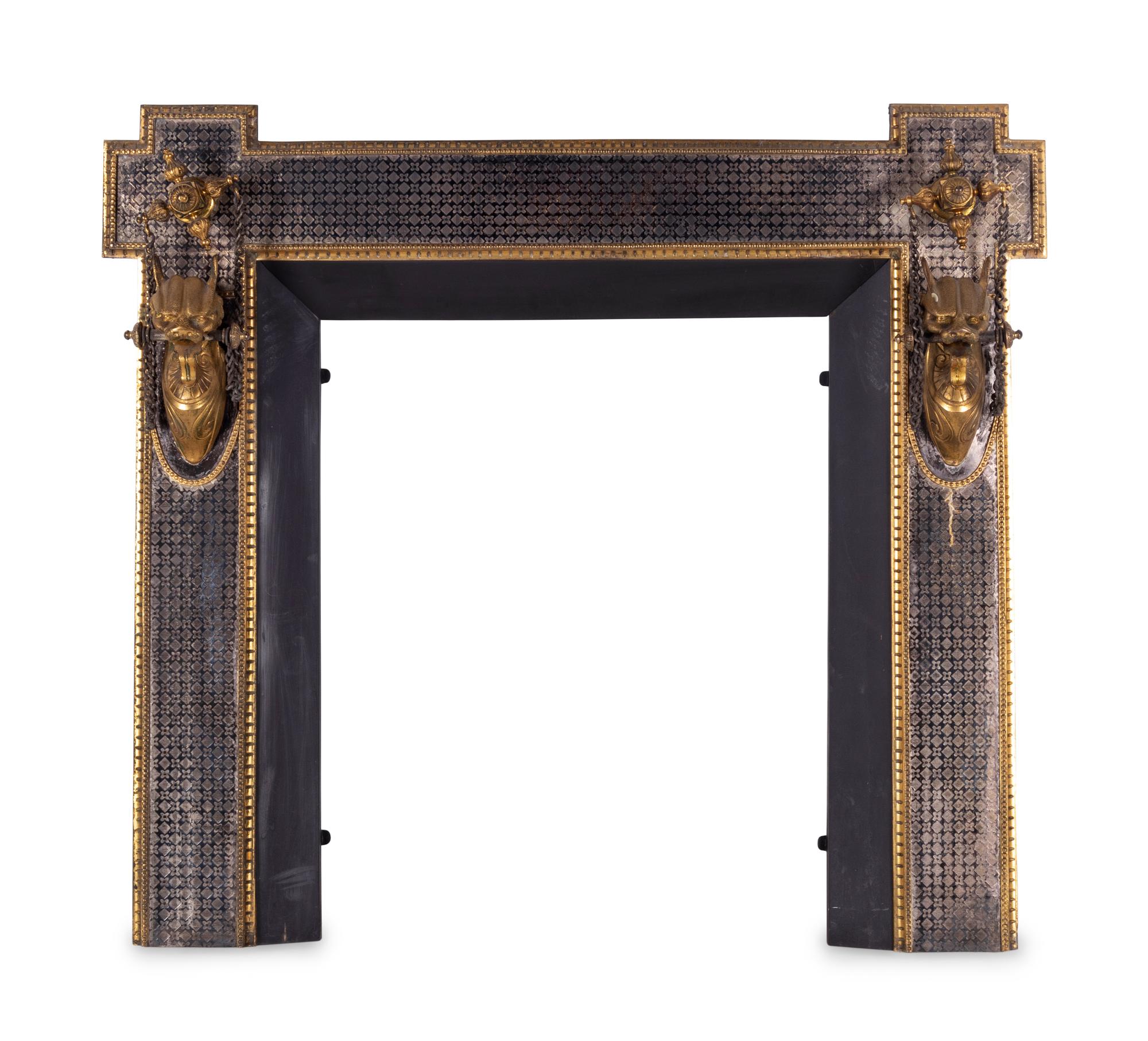 A Continental Silvered and Gilt Bronze Fireplace Surround