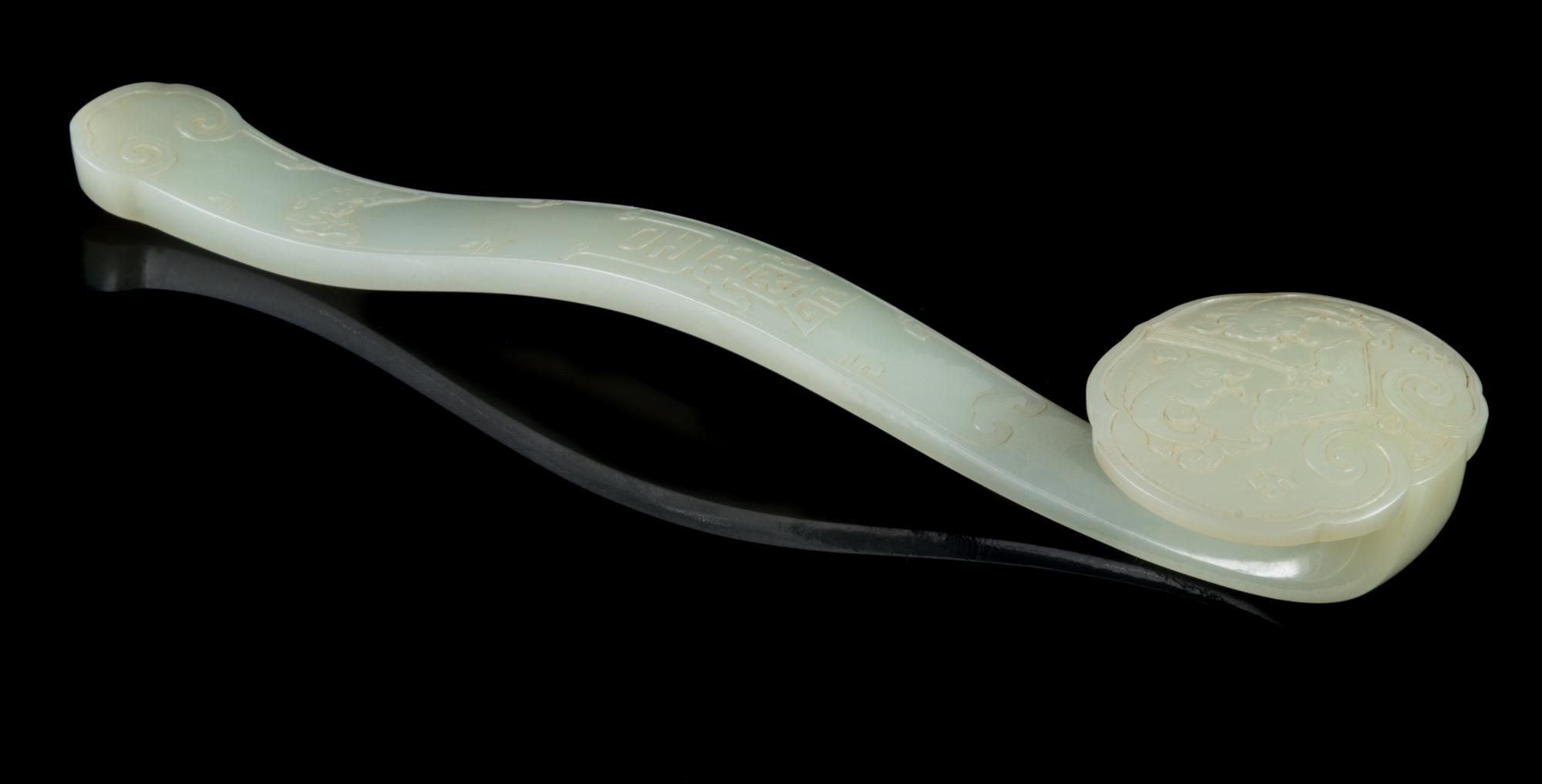 A Carved White Jade Ruyi Scepter Length 10 1/2 inches. — 18TH/19TH CENTURY