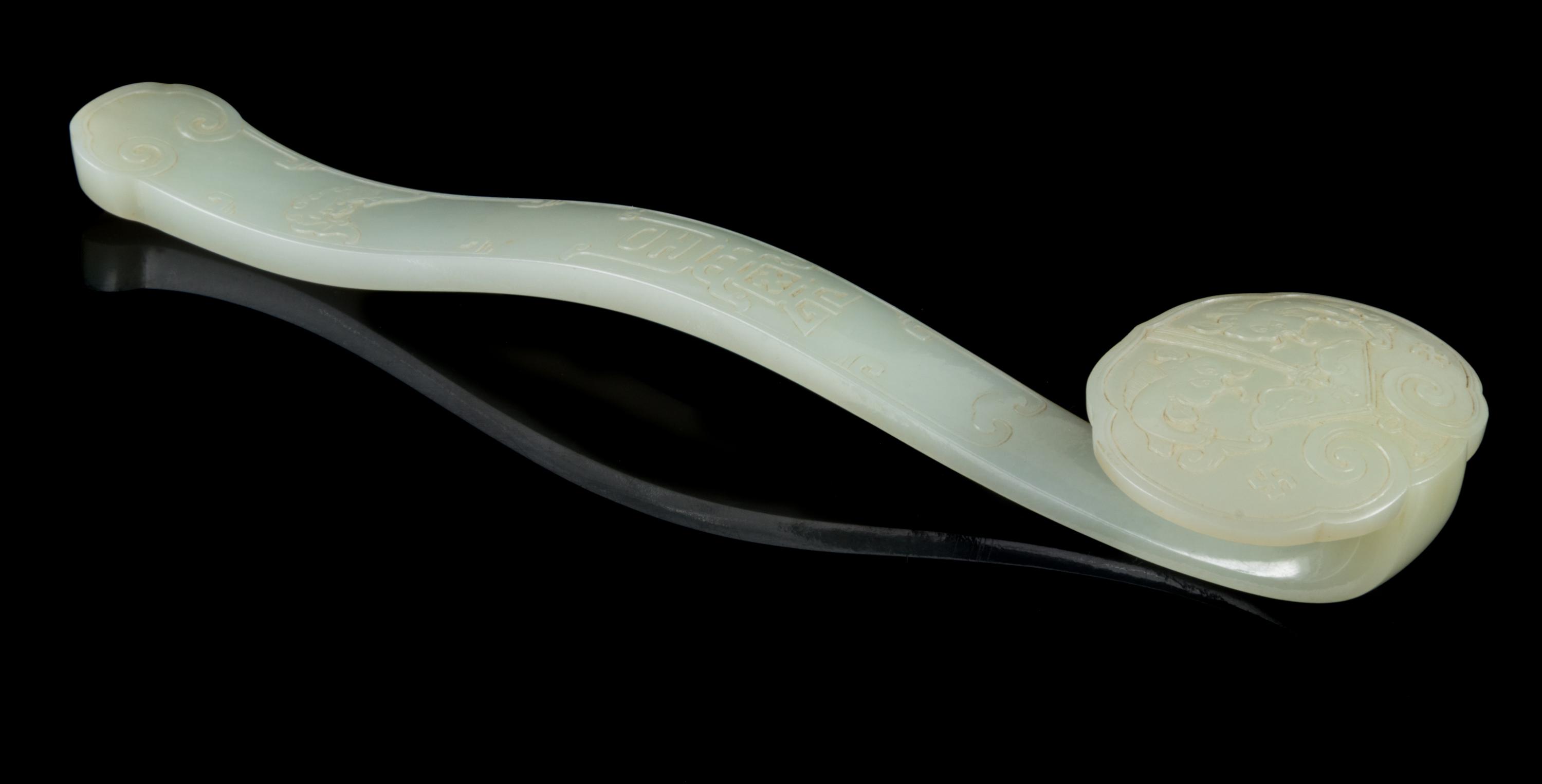 A Carved White Jade Ruyi Scepter Length 10 1/2 inches. — 18TH/19TH CENTURY