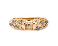 LUCIEN PICARD, YELLOW GOLD, STAR SAPPHIRE, AND DIAMOND BRACELET WATCH