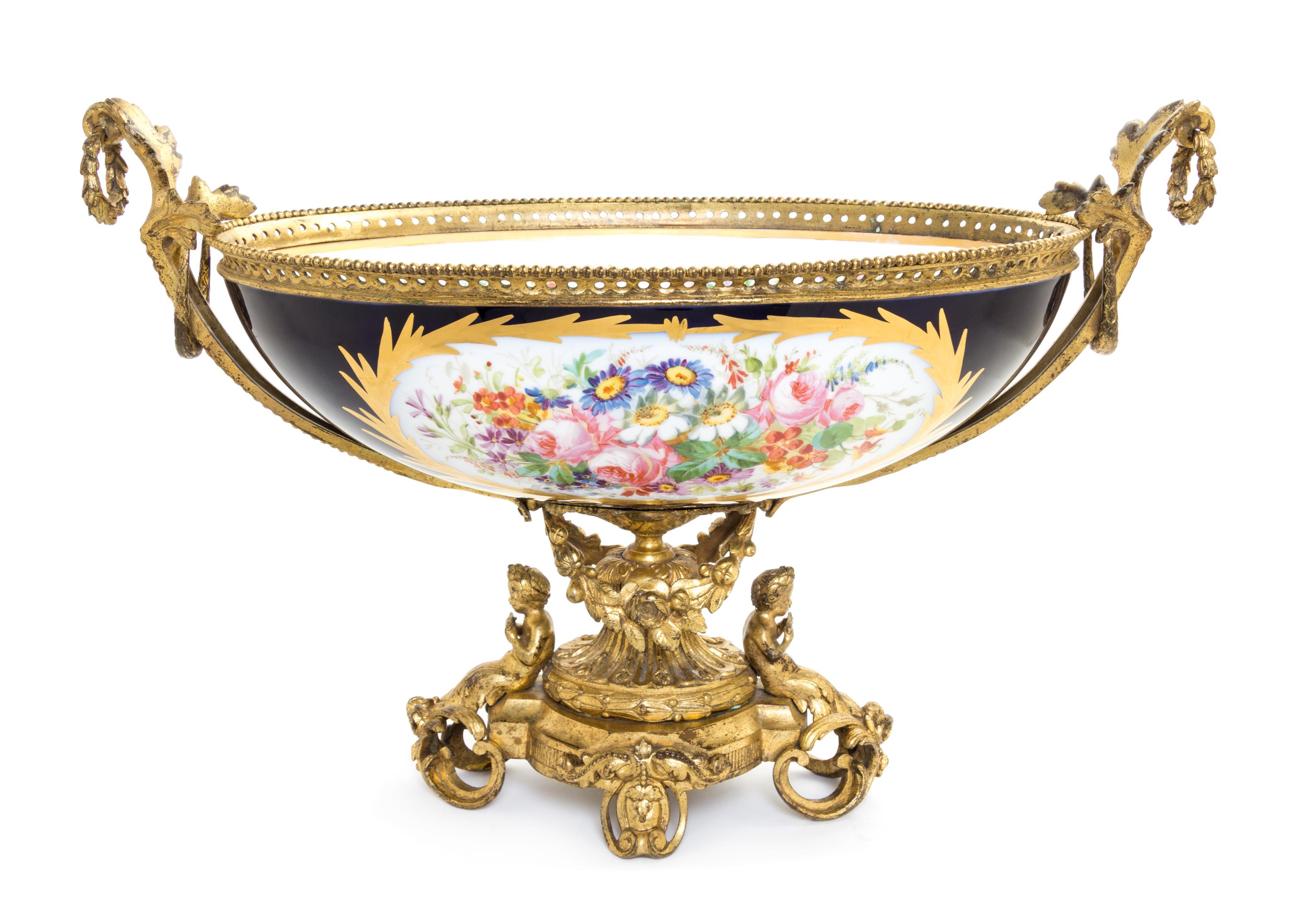 A Gilt Bronze Mounted Sevres Porcelain Center Bowl Width 22 1/4 inches. — 19TH CENTURY