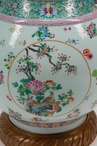 A Chinese Export Style Porcelain Vase on a Carved Giltwood Base