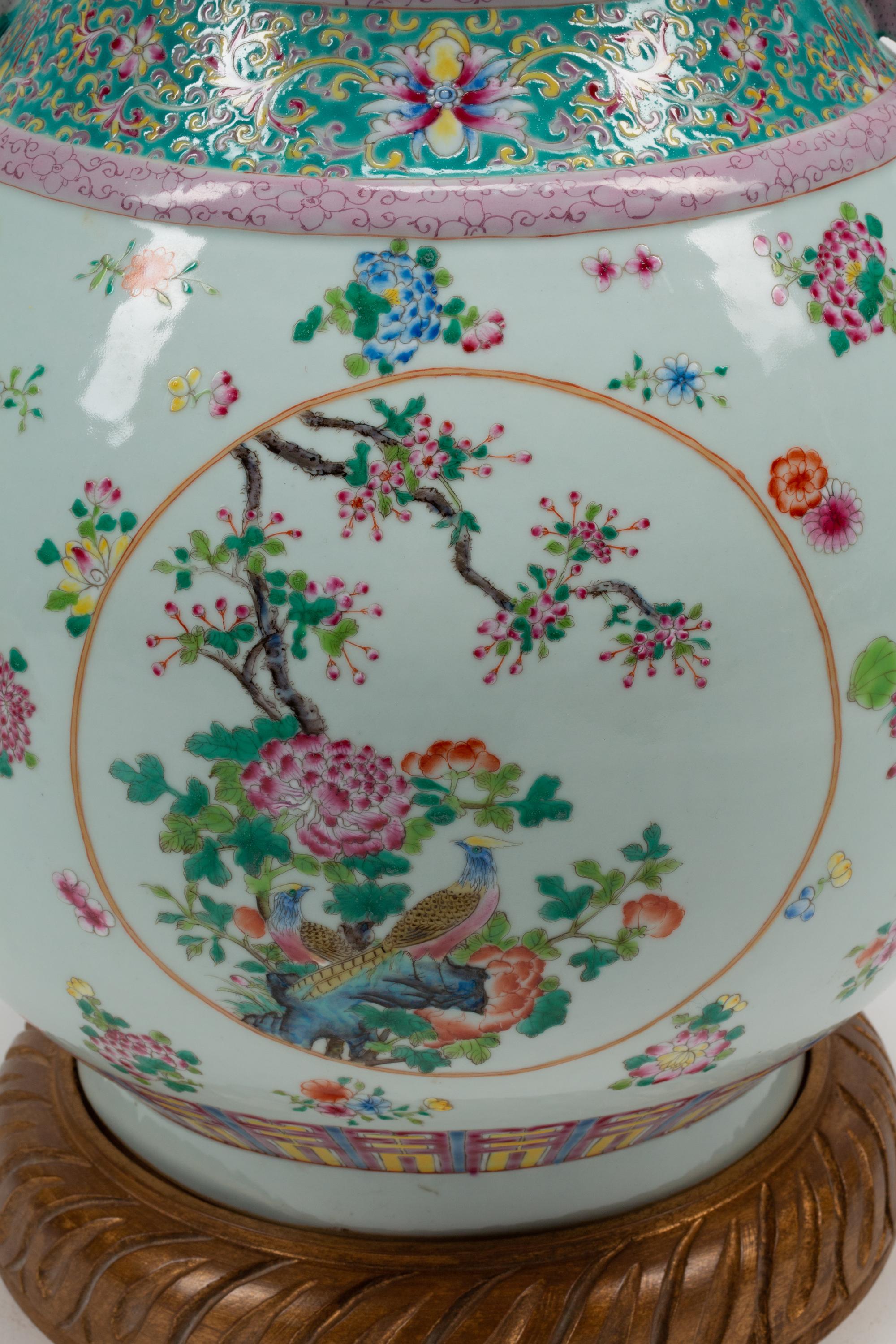A Chinese Export Style Porcelain Vase on a Carved Giltwood Base