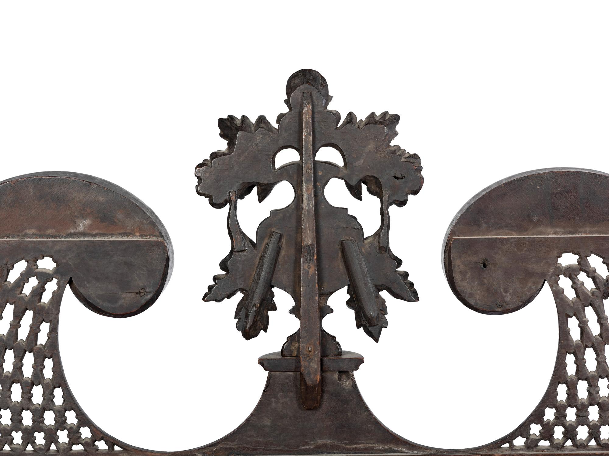 The Holcum Family Chippendale Pierce-Carved and Figured Mahogany Bonnet Top Chest-on-Chest