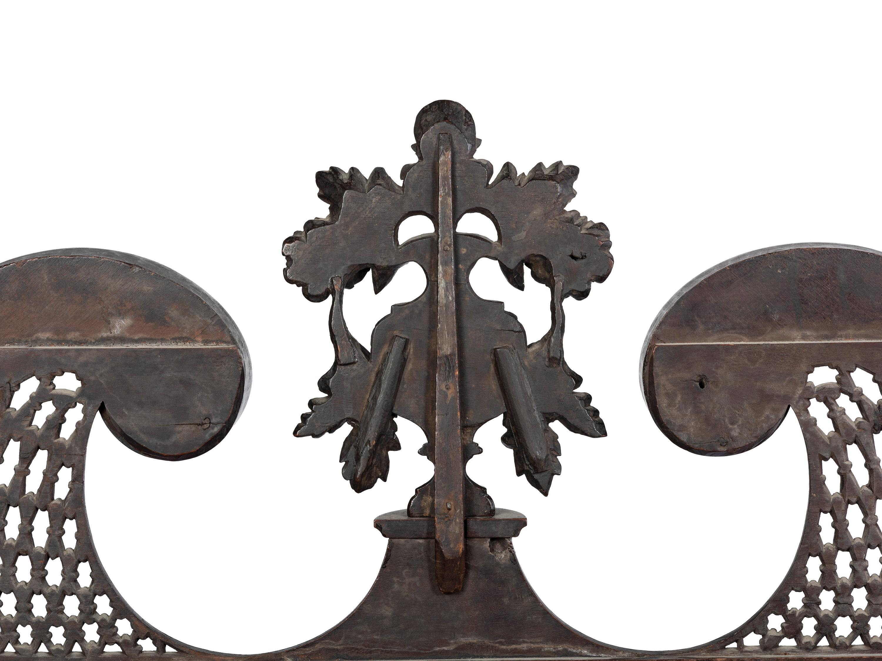 The Holcum Family Chippendale Pierce-Carved and Figured Mahogany Bonnet Top Chest-on-Chest