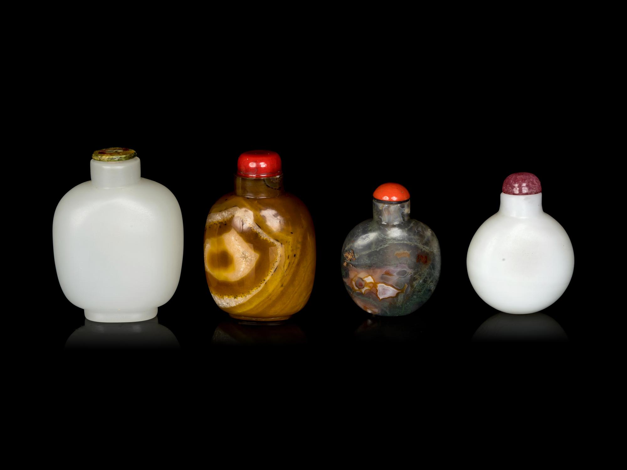 Four Chinese Hardstone and Peking Glass Snuff Bottles