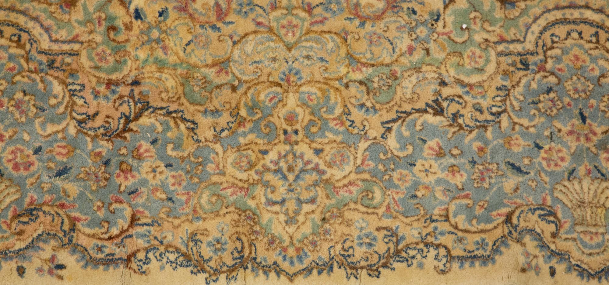A Kirman Wool Rug
