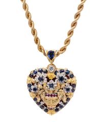 An 18 Karat Yellow Gold, Sapphire, Ruby, Diamond and Enamel Heart Motif Pendant, 26.10 dwts.