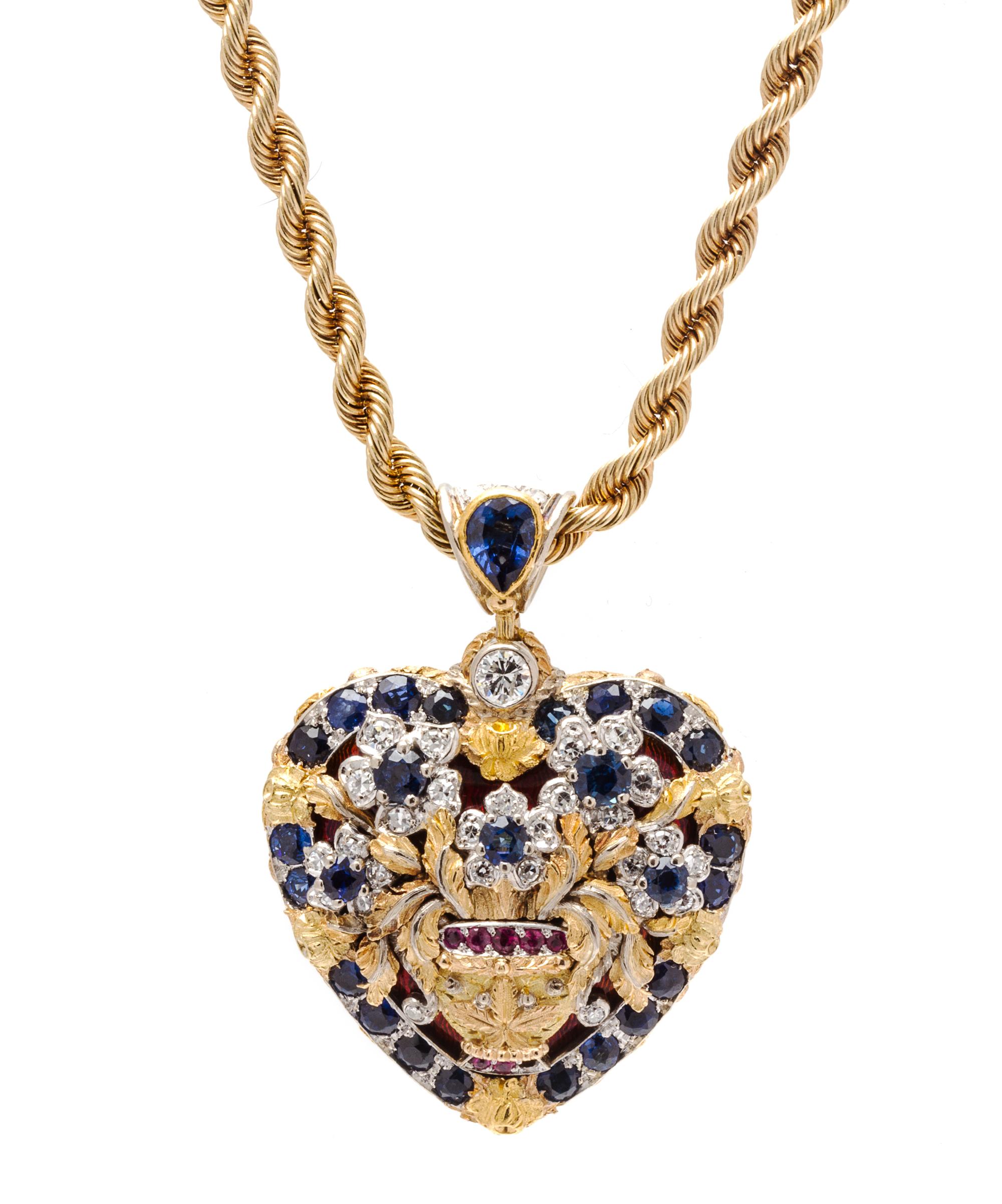 An 18 Karat Yellow Gold, Sapphire, Ruby, Diamond and Enamel Heart Motif Pendant, 26.10 dwts.