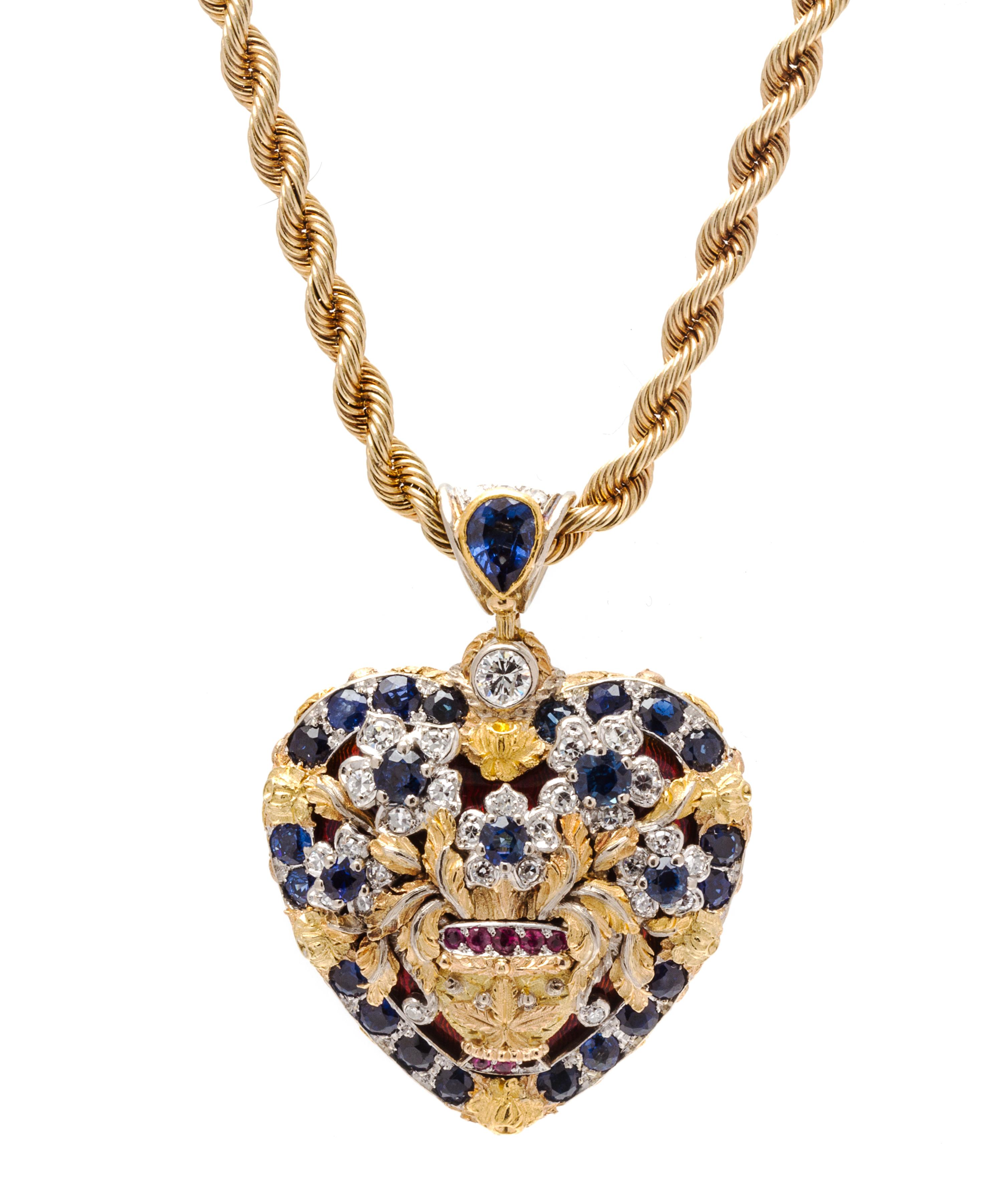 An 18 Karat Yellow Gold, Sapphire, Ruby, Diamond and Enamel Heart Motif Pendant, 26.10 dwts.
