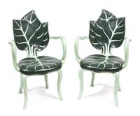 A Pair of Carved and Painted Arm Chairs Height 36 1/2 inches.