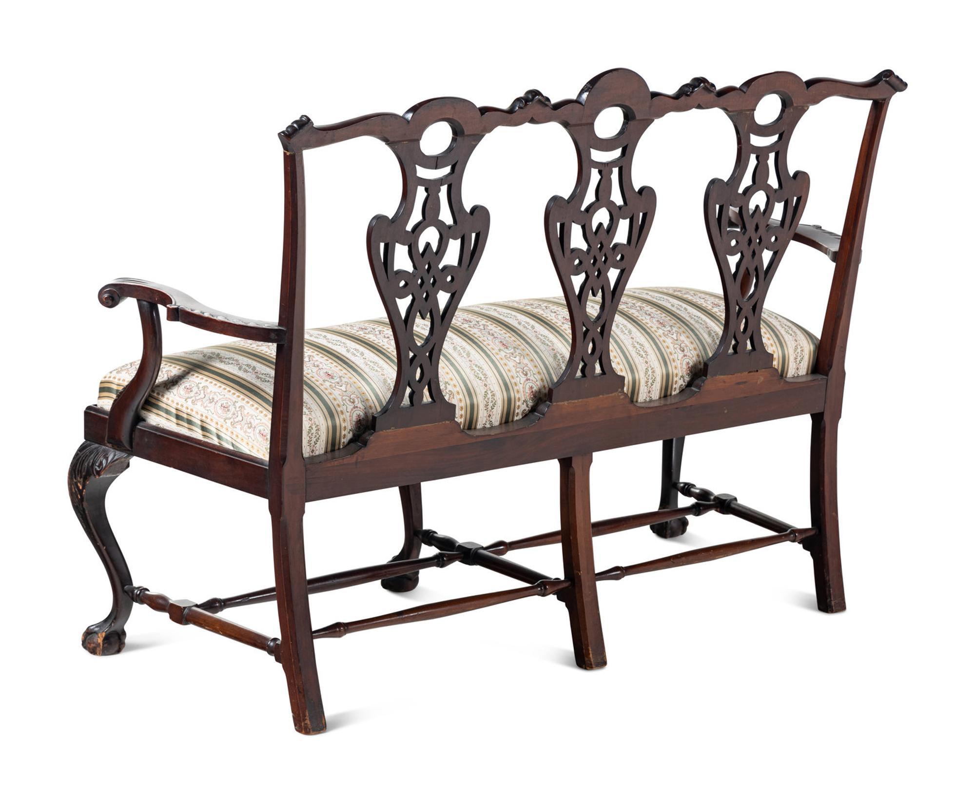A George III Style Carved Mahogany Settee