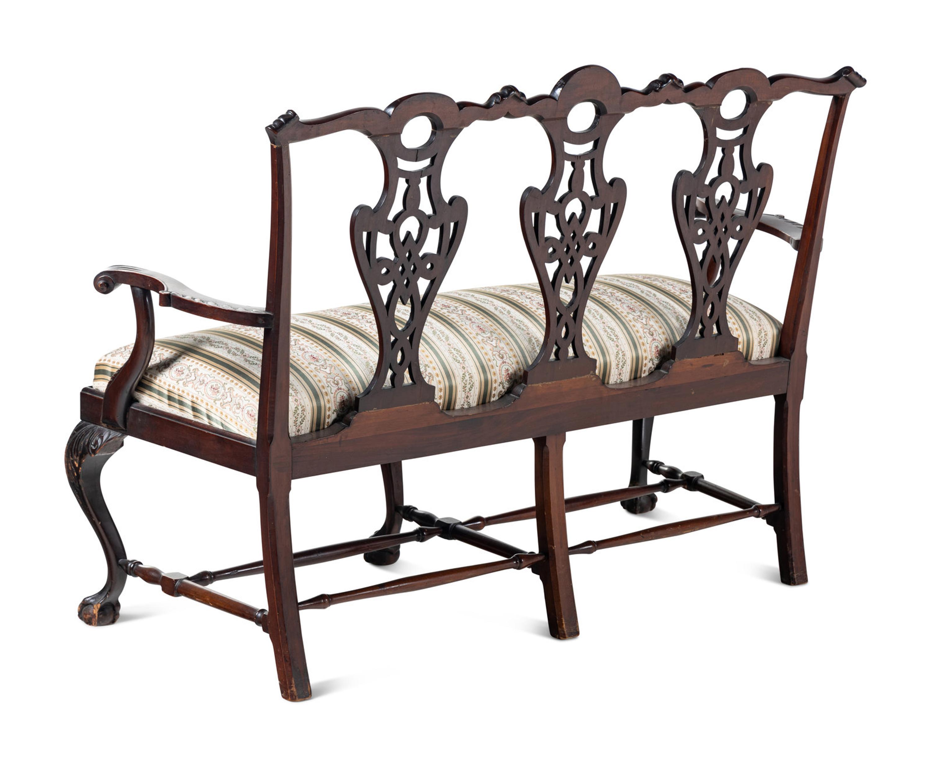 A George III Style Carved Mahogany Settee