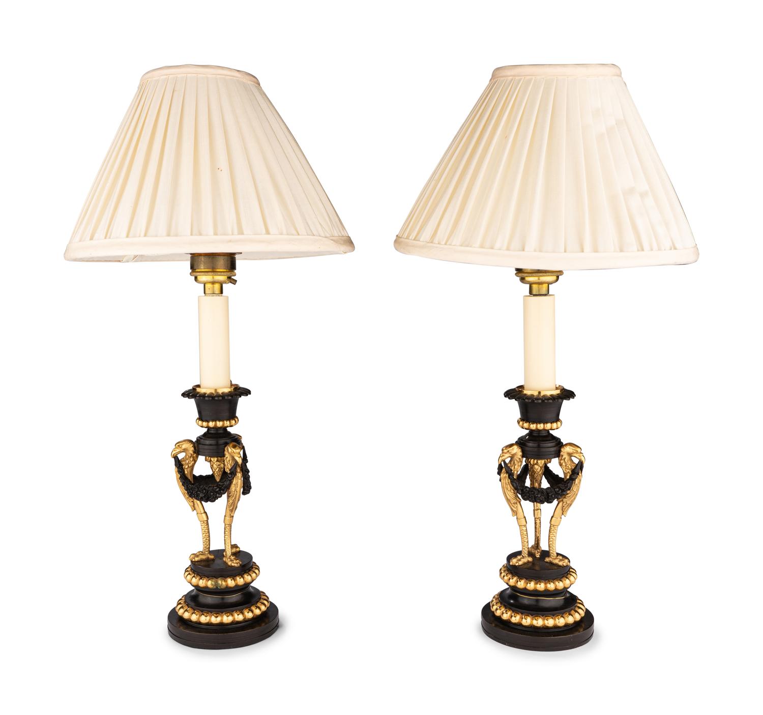 A Pair of Directoire Parcel-Gilt Bronze Candlesticks