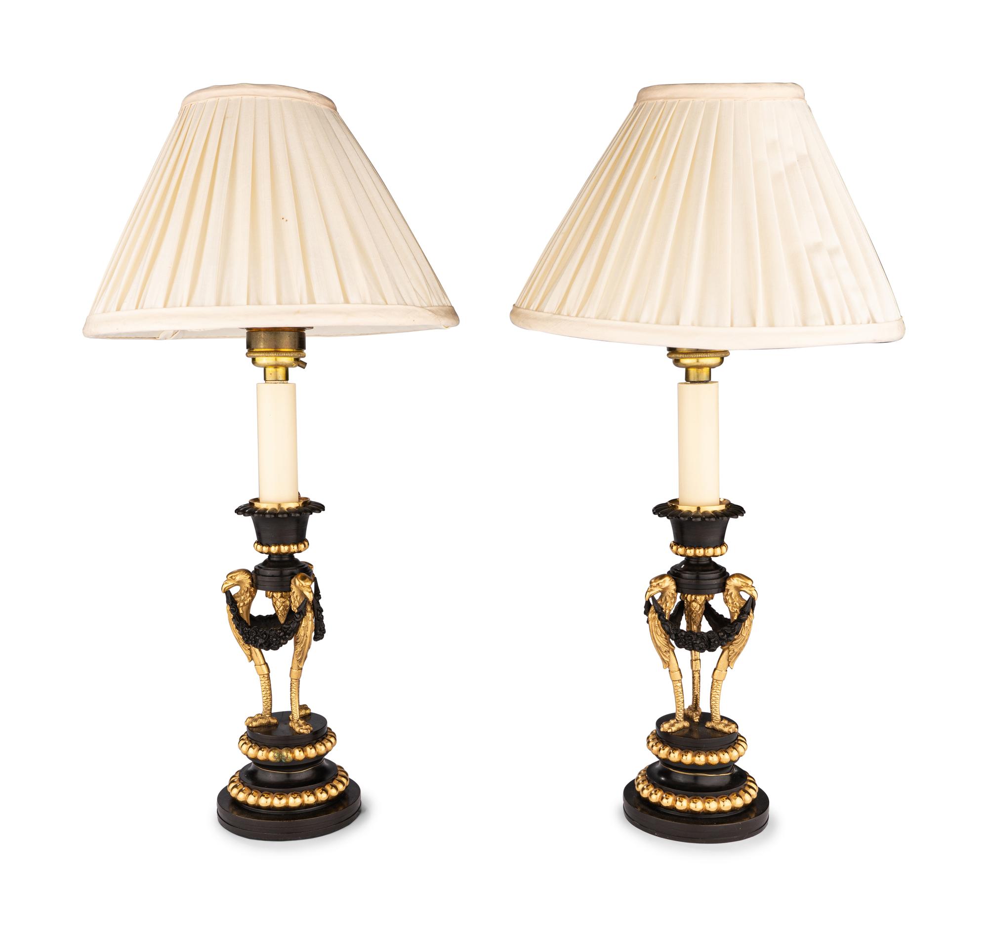 A Pair of Directoire Parcel-Gilt Bronze Candlesticks