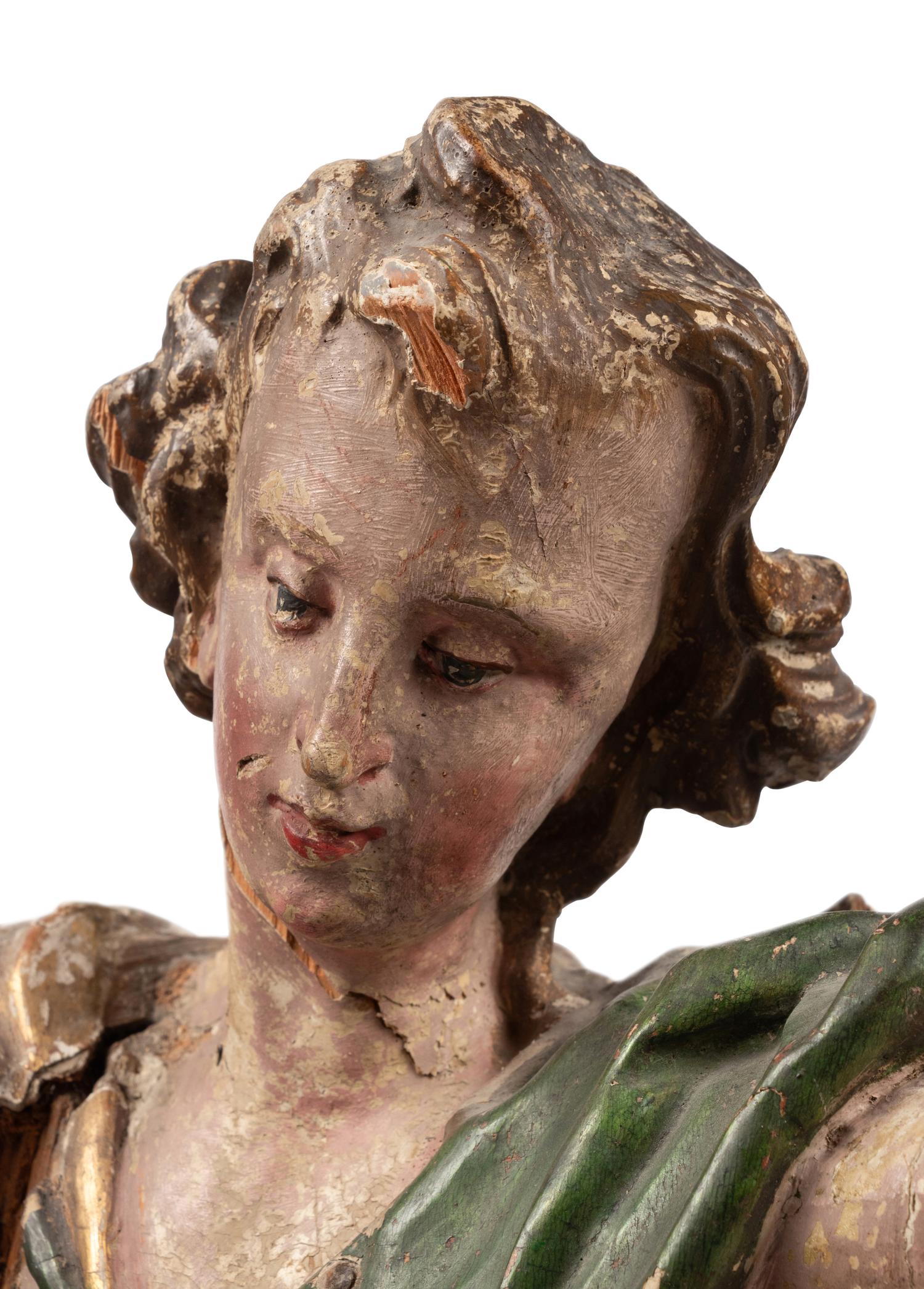 An Italian Polychrome Painted and Parcel-Gilt Figure of a Saint