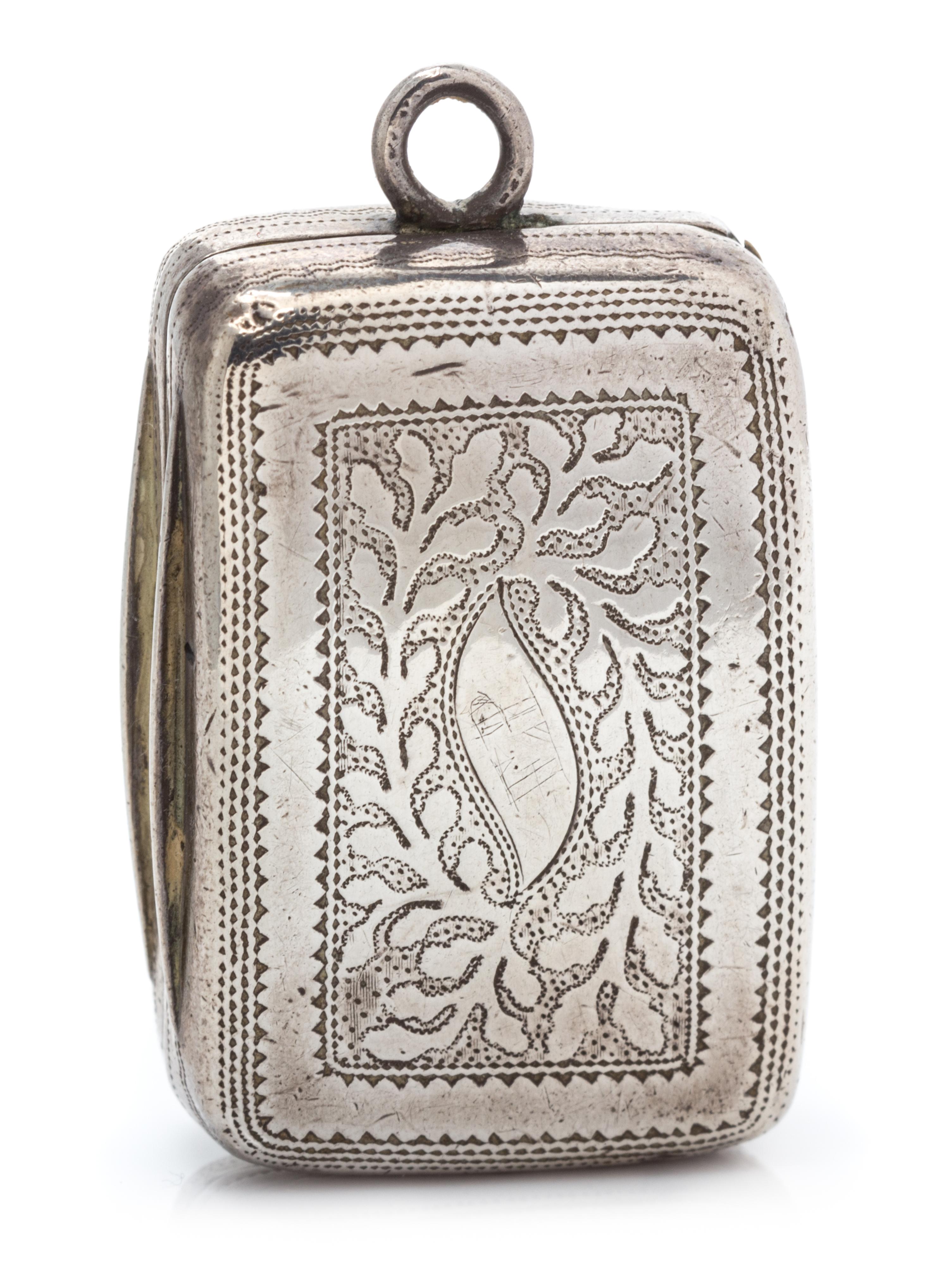 A George III Silver Vinaigrette, Joseph Taylor, Birmingham, 1814, the lid having foliate decoration and centered by a monogrammed carto