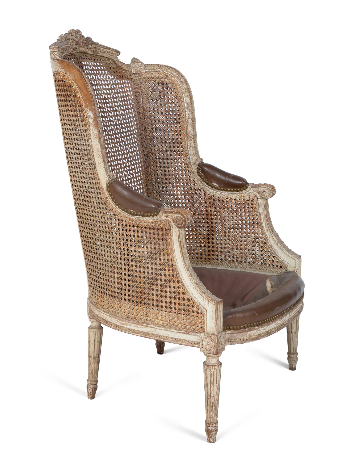A Louis XVI Style Caned Bergere — LATE 19TH/EARLY 20TH CENTURY