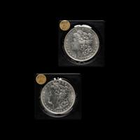 Two 1899-O Morgan $1 Coins