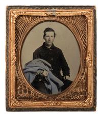 [CIVIL WAR]. Sixth plate ambrotype of Frank M. Chamberlin, Co. I, 79th New York Volunteers. N.p., ca 1862.