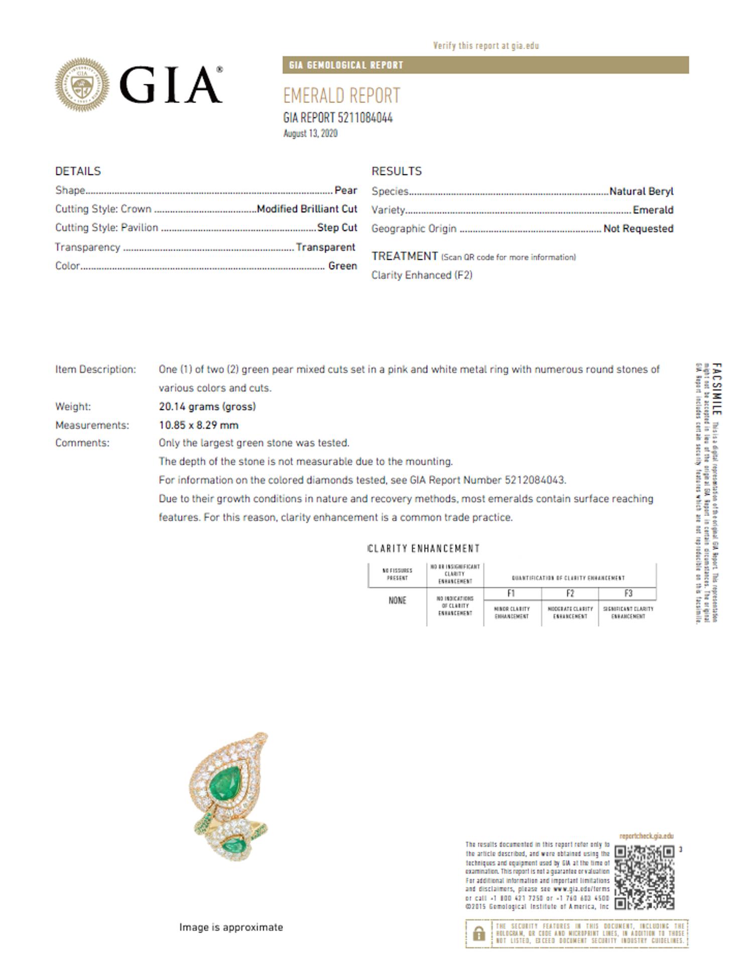 EMERALD, COLORED DIAMOND, AND DIAMOND BYPASS LEAF RING