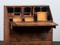 A Chippendale Carved Tiger Maple Slant-Front Desk