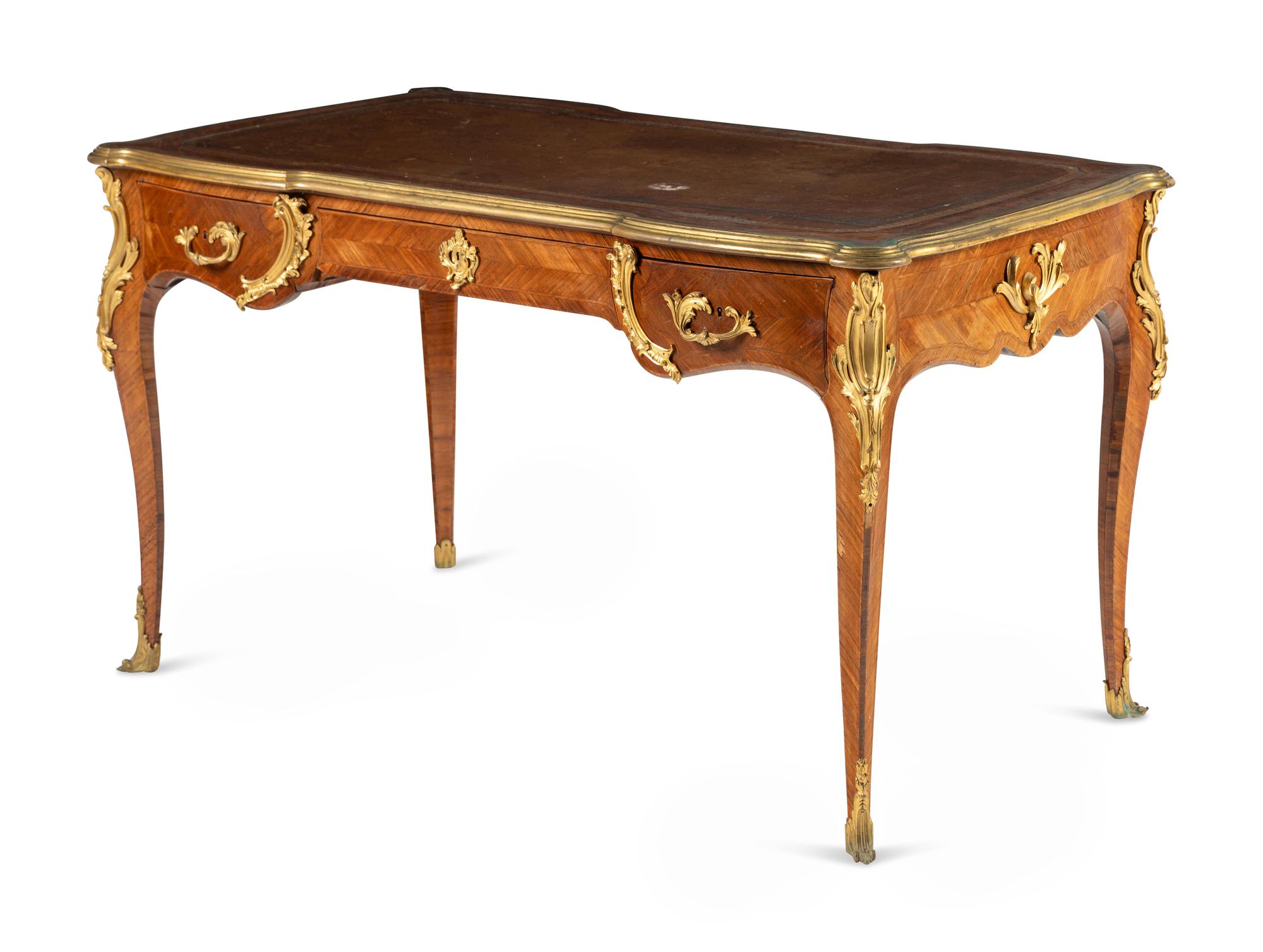 A Louis XV Style Gilt Bronze Mounted Parquetry Bureau Plat