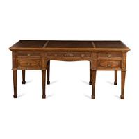 A George III Style Carved Mahogany Partner's Desk