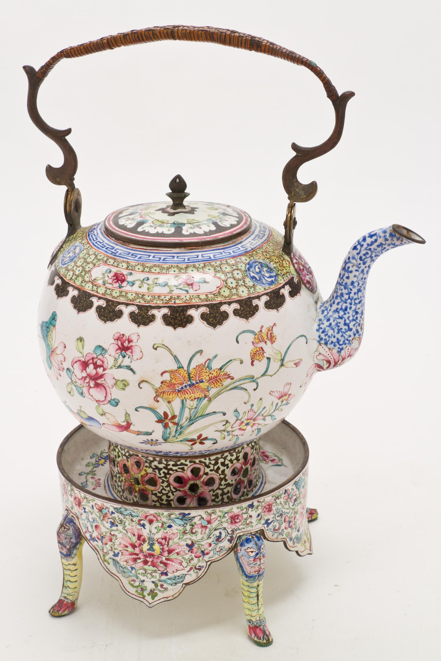 A Canton Enamel Teapot on Warming Stand, Height over handle 11 1/2 inches.