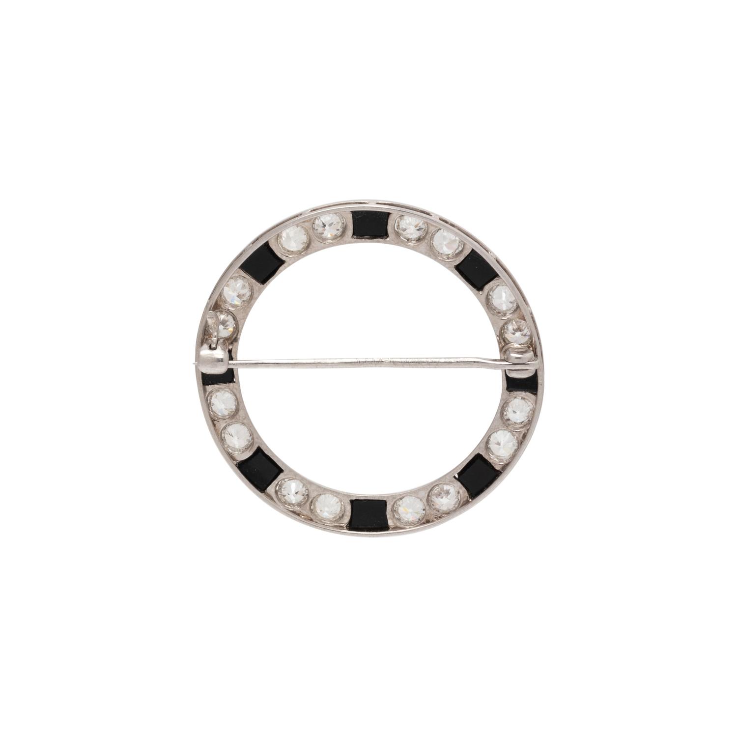 DIAMOND AND ONYX CIRCLE BROOCH