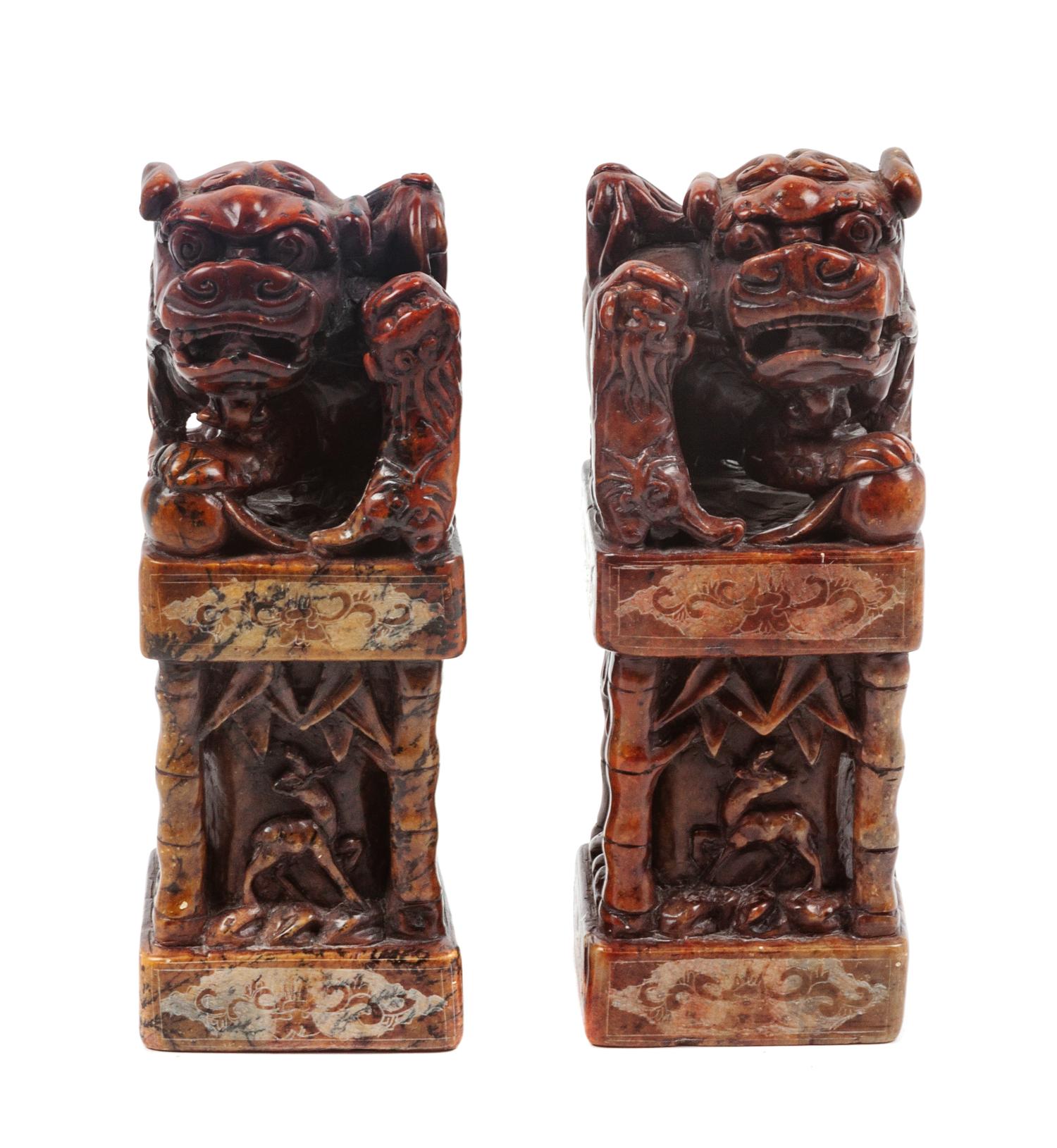 A Pair of Chinese Foo Dog Soapstone Stamp Sealers Height 8 inches.